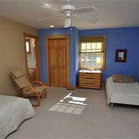 Twin bedroom 2. Now has new pine flooring and fresh neutral paint!