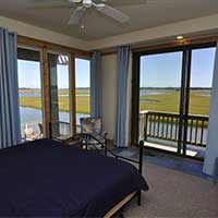 King Bedroom 1 of 4.  Views of Assateague, right over Deep Hole Creek